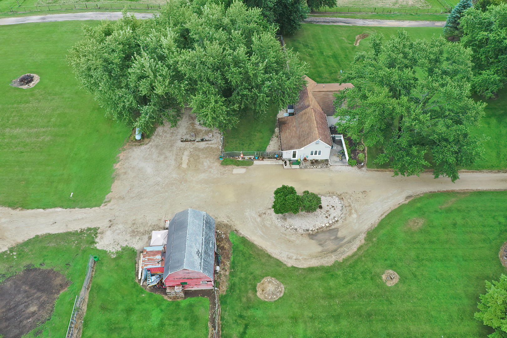 19212 Crowley Road Harvard, IL 60033 - Photo 36 of 38 a view of a table and chairs in the garden
