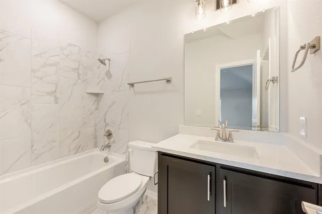 a view of a building with a window and balcony