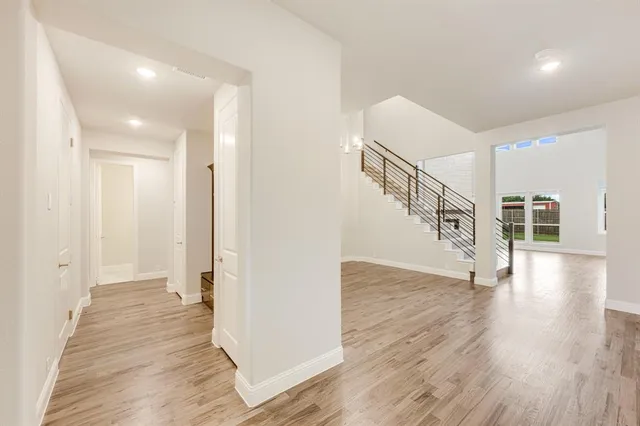 a view of entryway with wooden floor