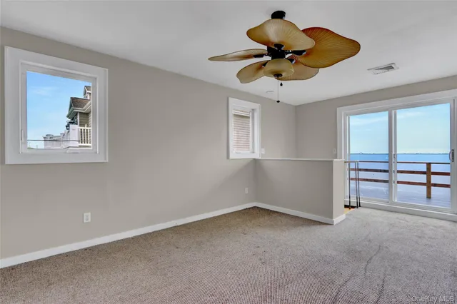 a view of storage and utility room with washer and dryer