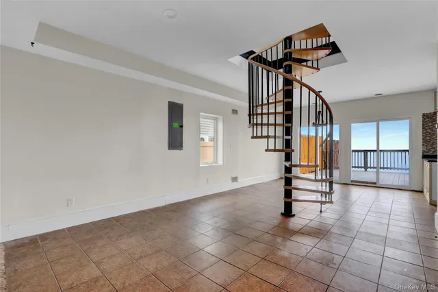 a view of entryway and hall with a window