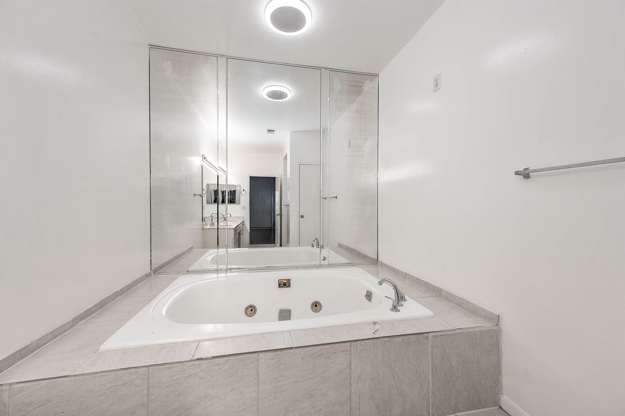 6000 Reims Road, Unit 2003 Houston, TX 77036 - Photo 17 of 24 a bathroom with a bathtub and a shower