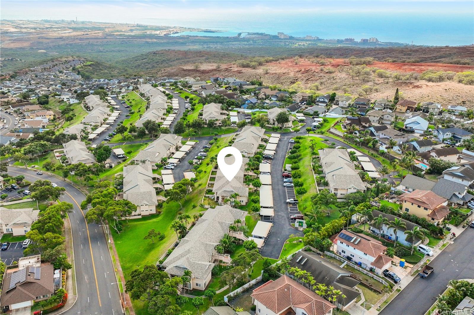 92-1232 Palahia Street, Unit AA102 Kapolei, HI 96707 - Photo 21 of 25 an aerial view of residential houses with outdoor space