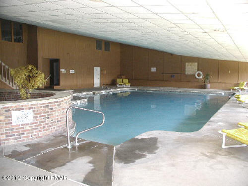 200 Oak Street Mount Pocono, PA 18344 - Photo 5 of 7 a swimming pool with outdoor seating and yard