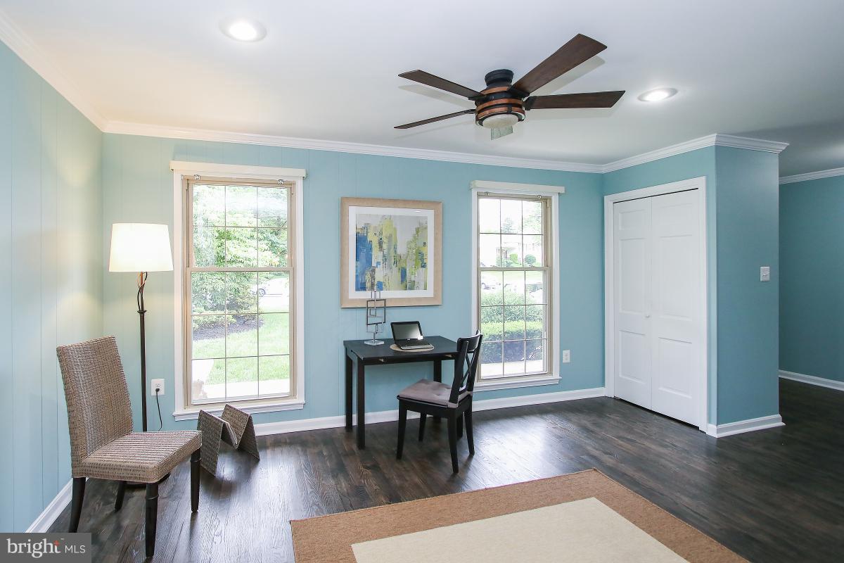 13121 Tamarack Road Silver Spring, MD 20904 - Photo 12 of 30 a living room with furniture and a wooden floor