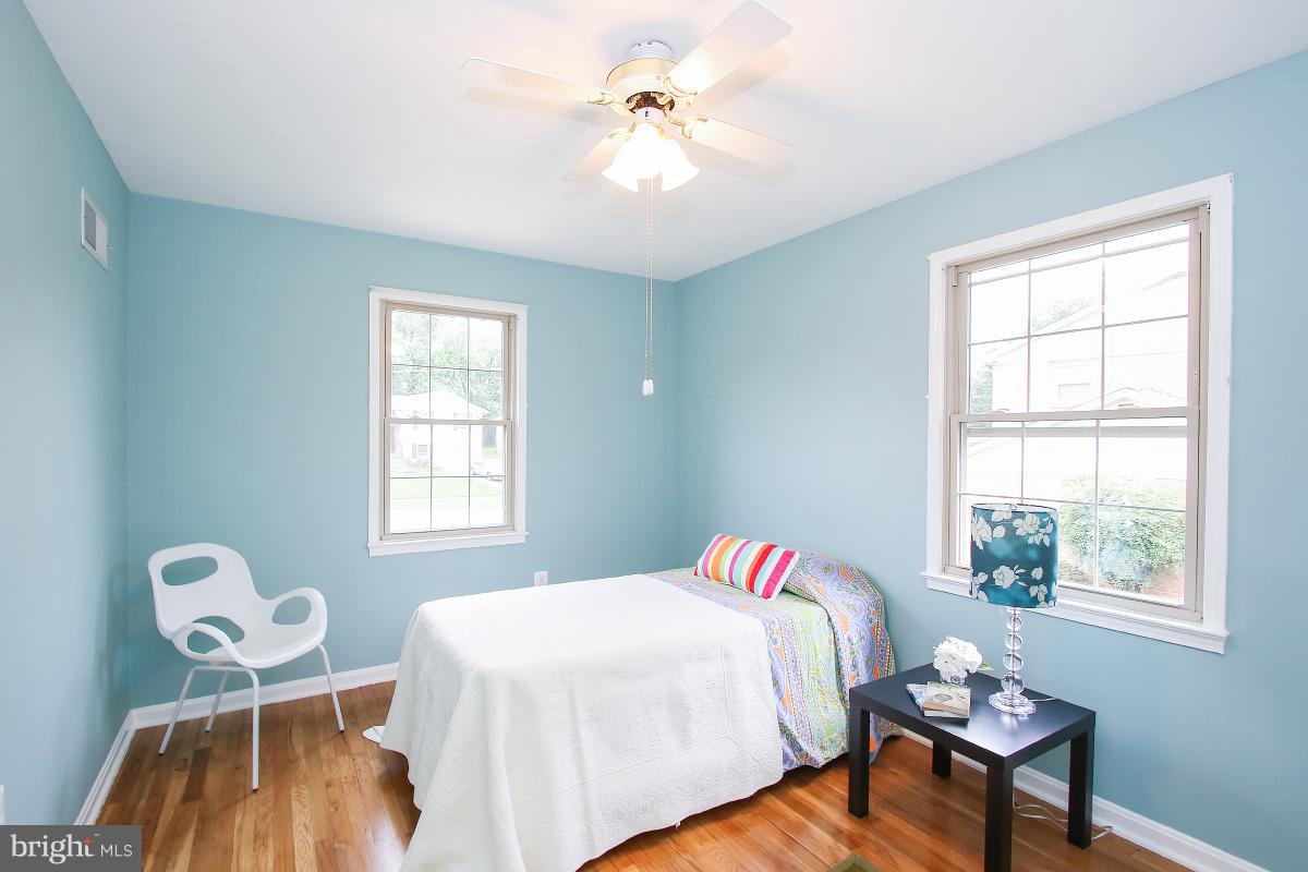 13121 Tamarack Road Silver Spring, MD 20904 - Photo 18 of 30 a bedroom with a bed and a window