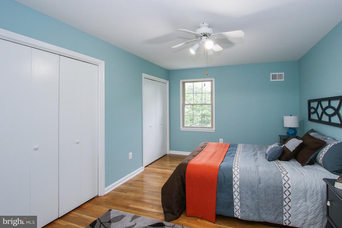 13121 Tamarack Road Silver Spring, MD 20904 - Photo 21 of 30 a bedroom with a bed and window