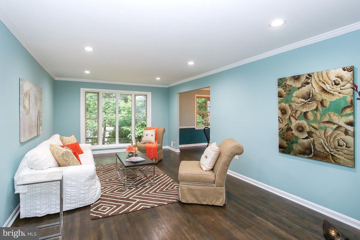13121 Tamarack Road Silver Spring, MD 20904 - Photo 7 of 30 a living room with furniture and a large window
