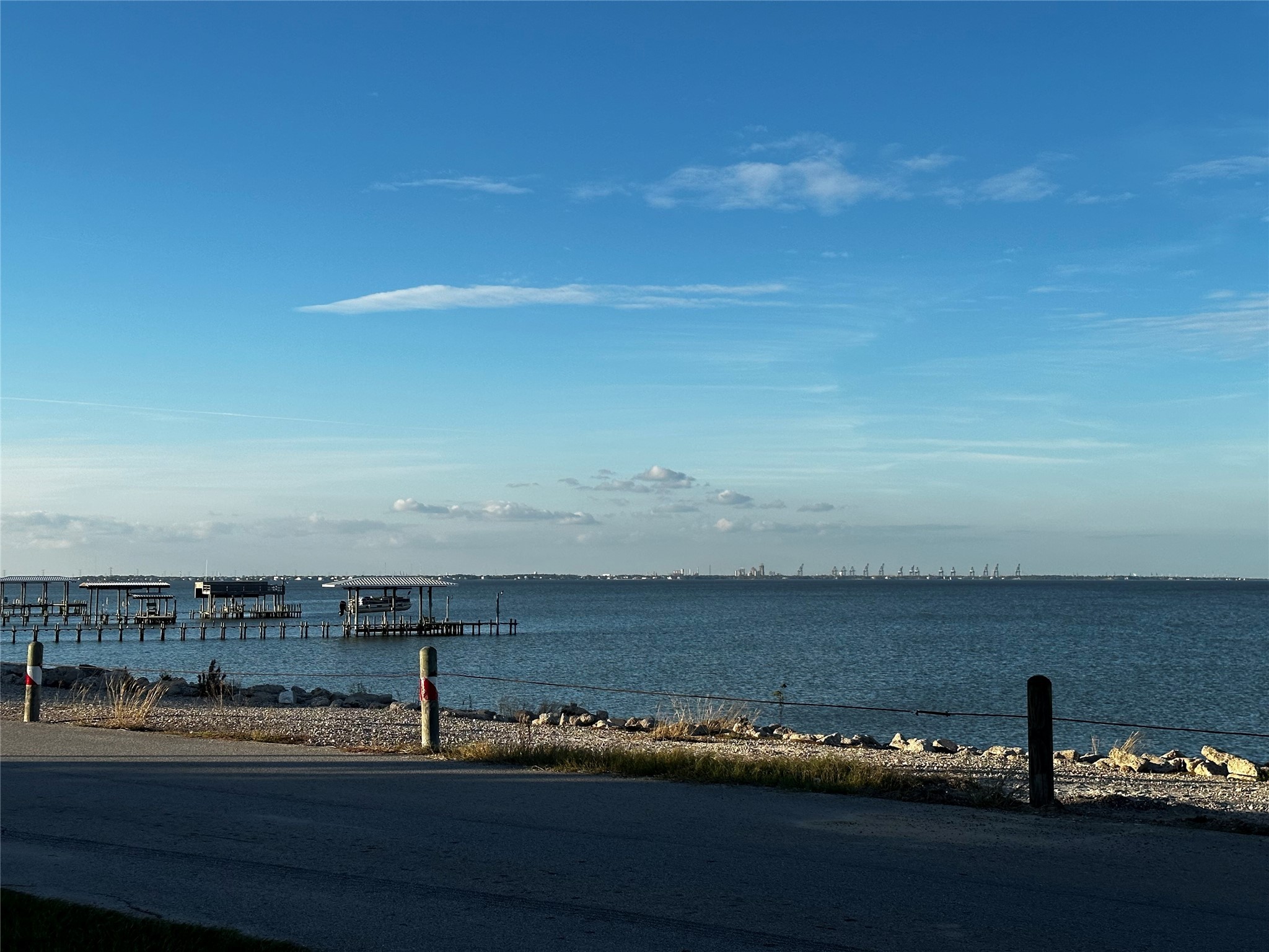 4318 1st Street, Unit B Bacliff, TX 77518 - Photo 18 of 21 a view of a lake with a nearby beach