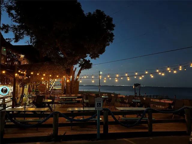 a view of a lobby with furniture and a potted plant