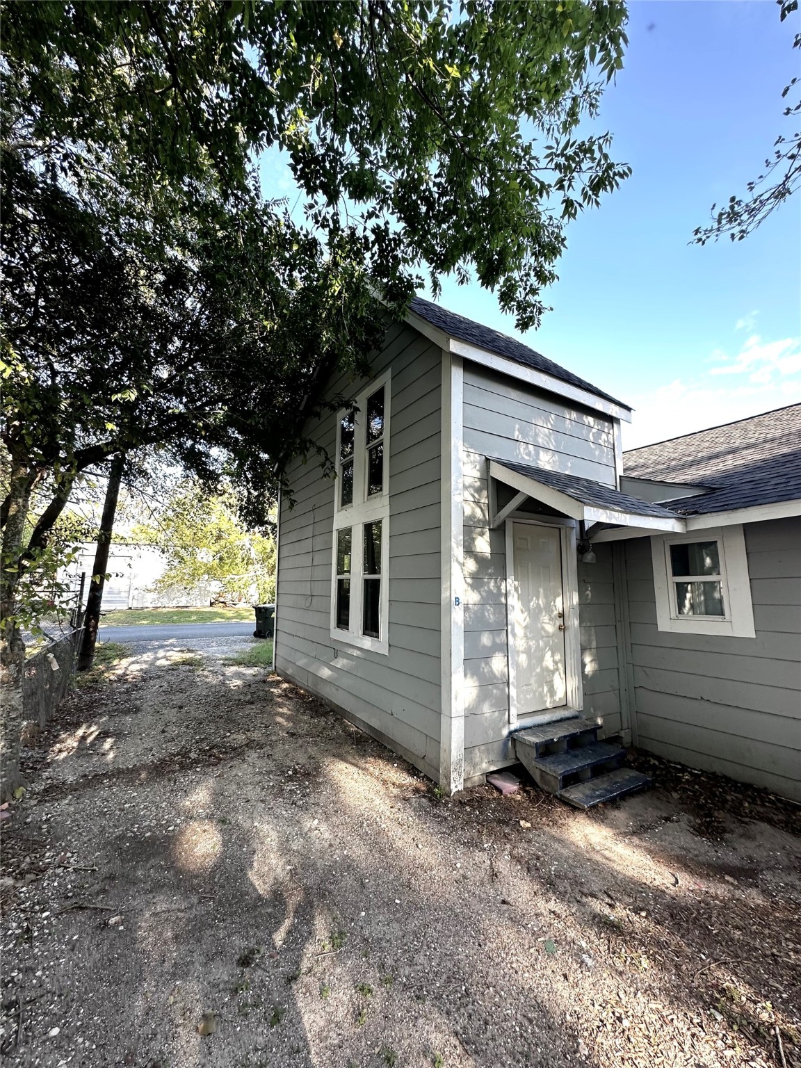 4318 1st Street, Unit B Bacliff, TX 77518 - Photo 2 of 21 a view of house with backyard space and balcony