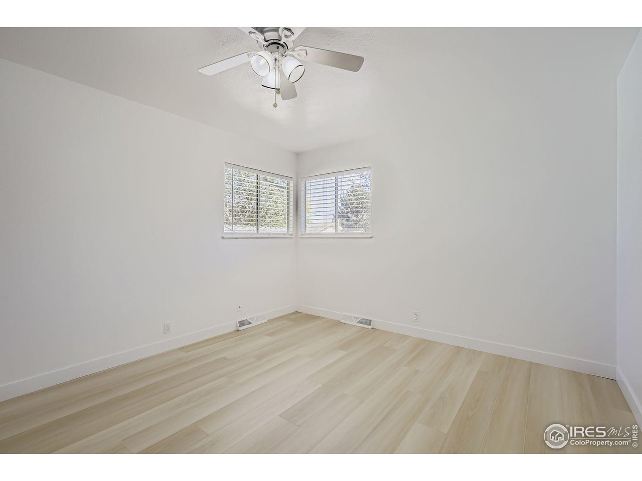 604 Colorado Street Fort Collins, CO 80524 - Photo 14 of 32 a view of an empty room with a window