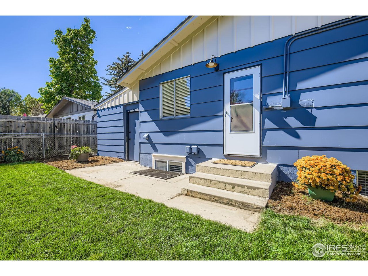 604 Colorado Street Fort Collins, CO 80524 - Photo 27 of 32 a view of a house with backyard and sitting area