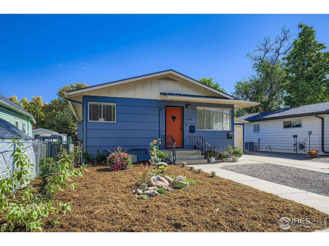 604 Colorado Street Fort Collins, CO 80524 - Photo 4 of 32 a backyard of a house with seating space