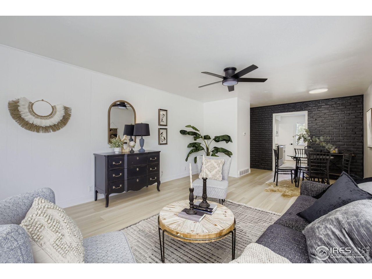 604 Colorado Street Fort Collins, CO 80524 - Photo 7 of 32 a living room with furniture and a table