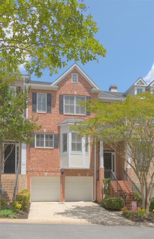 3006 Riverstone Trail Atlanta, GA 30339 - Photo 1 of 1 a front view of a house with a yard and garage