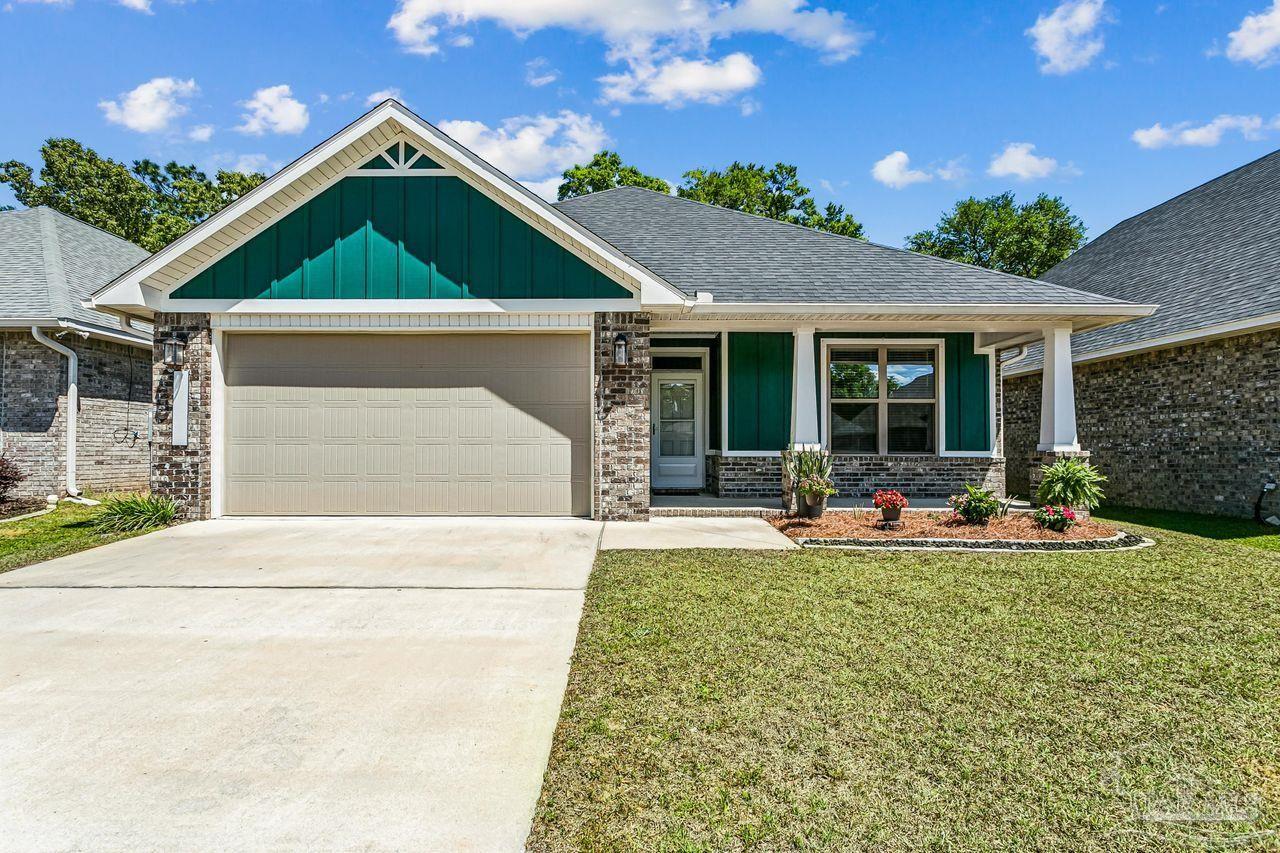 3875 Shady Grove Drive Pace, FL 32571 - Photo 2 of 31 a view of backyard of a house