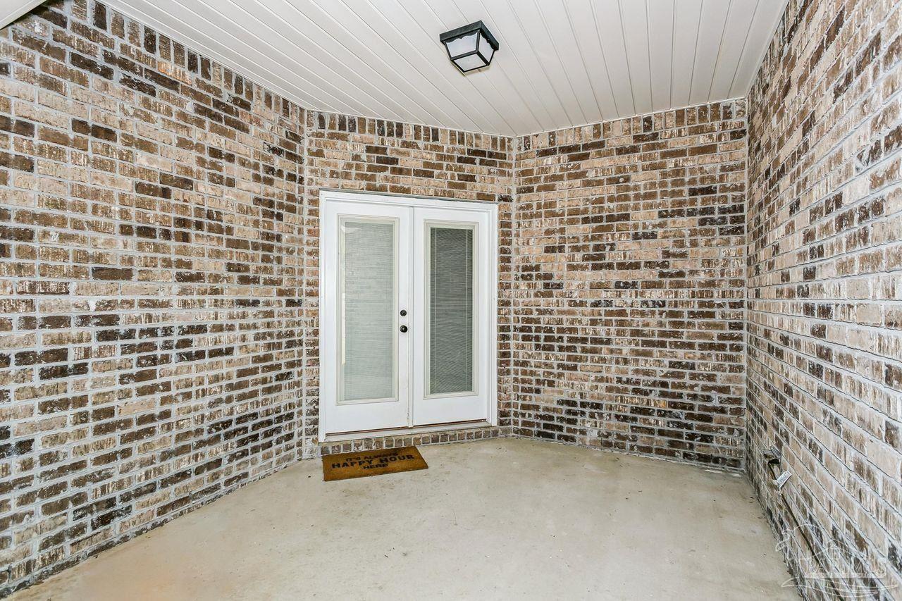 3875 Shady Grove Drive Pace, FL 32571 - Photo 25 of 31 a bathroom with a shower