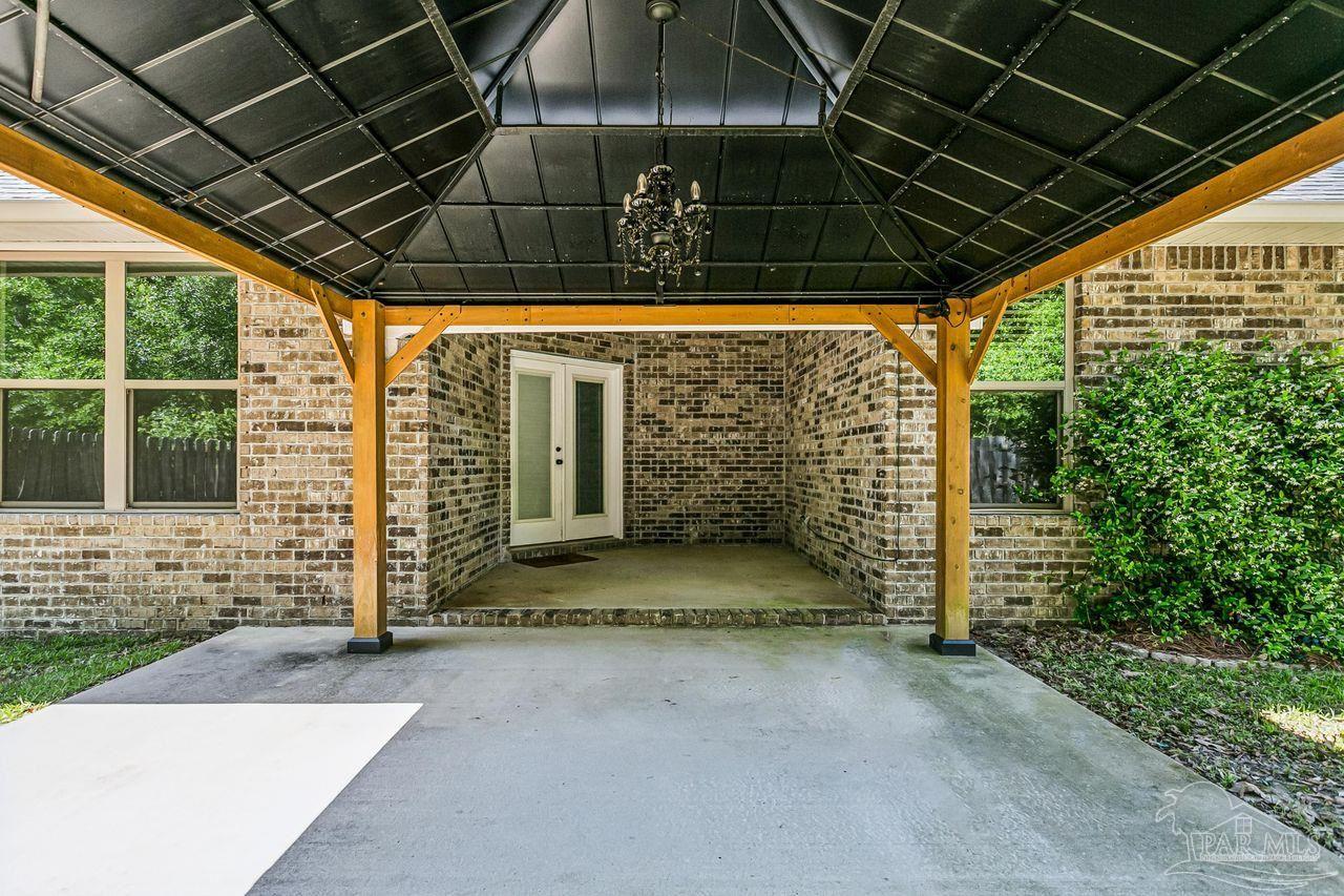 3875 Shady Grove Drive Pace, FL 32571 - Photo 27 of 31 a view of outdoor space and porch