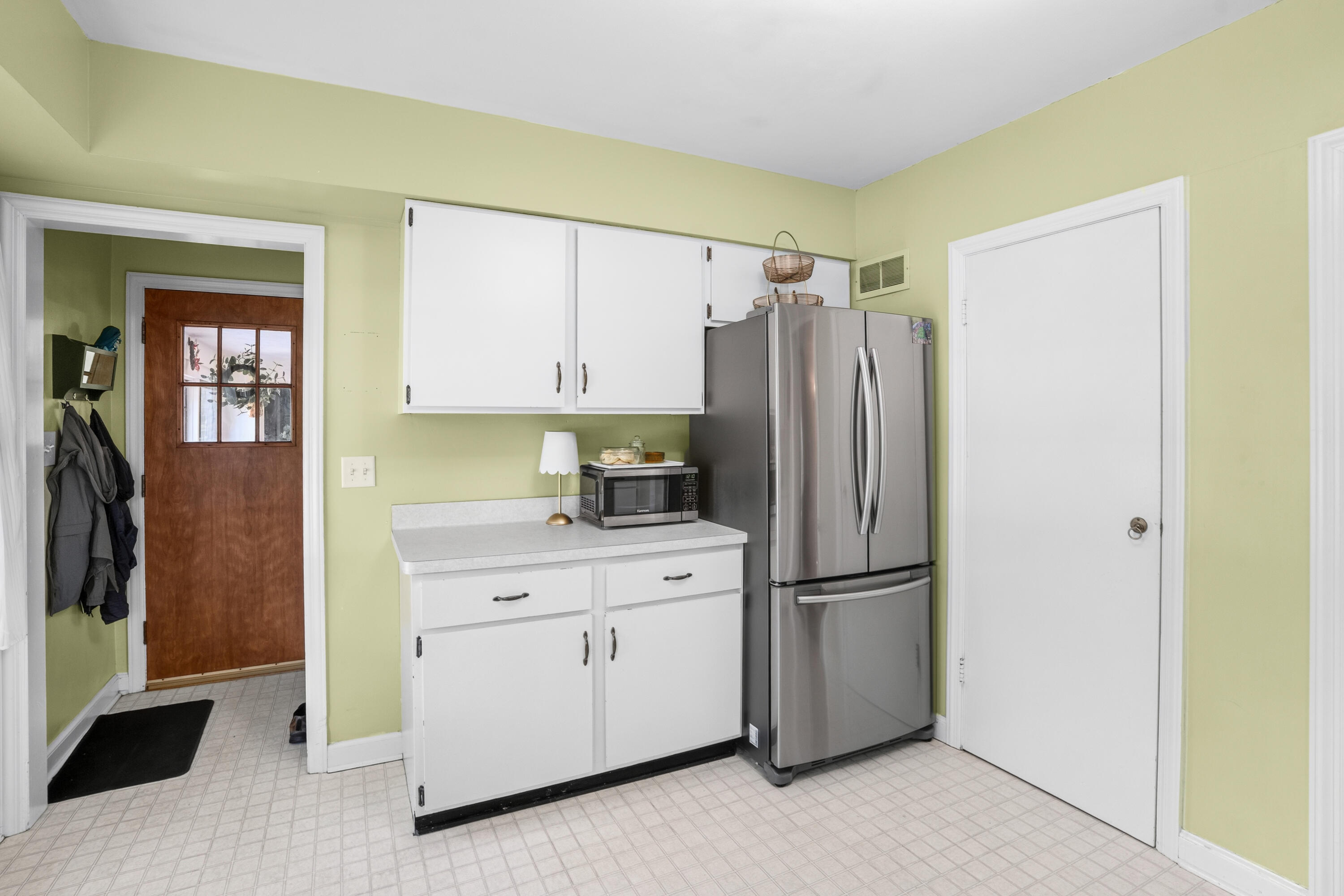 7603 North Fairchild Road Fox Point, WI 53217 - Photo 6 of 18 Pantry Closet next to Fridge