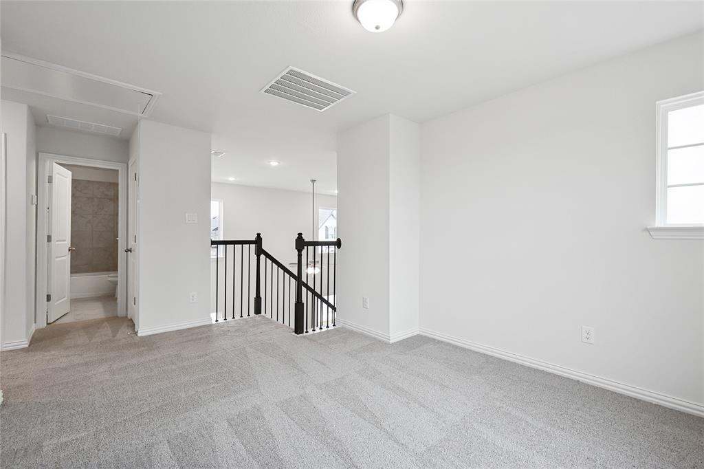 3900 Coco Lane Sherman, TX 75090 - Photo 19 of 40 Unfurnished room with light carpet