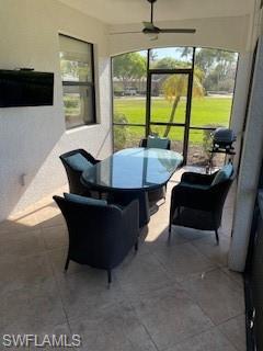 3149 Aviamar Circle, Unit 101 Naples, FL 34114 - Photo 20 of 20 a living room with furniture and a flat screen tv