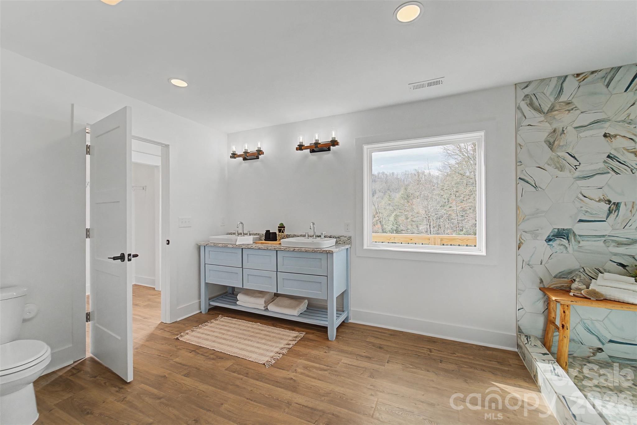 1012 Sols Creek Church Road Tuckasegee, NC 28783 - Photo 14 of 25 a view of room with window and bathroom