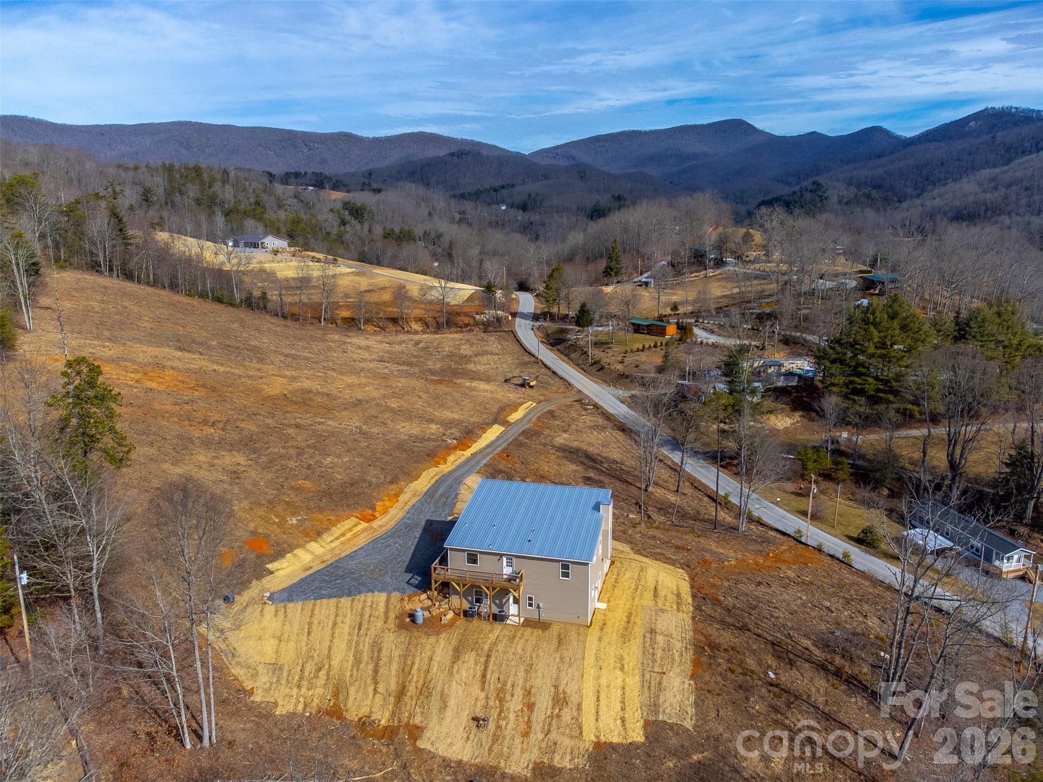 1012 Sols Creek Church Road Tuckasegee, NC 28783 - Photo 22 of 25 a view of a city from a terrace
