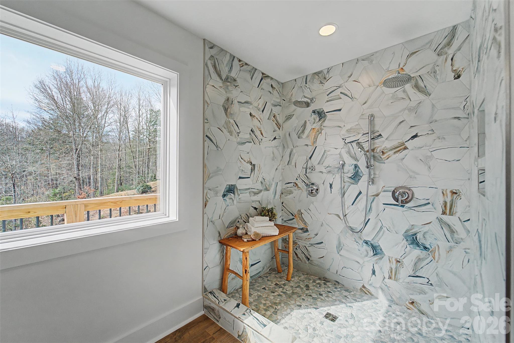 1012 Sols Creek Church Road Tuckasegee, NC 28783 - Photo 5 of 25 a bathroom with a bathtub and shower