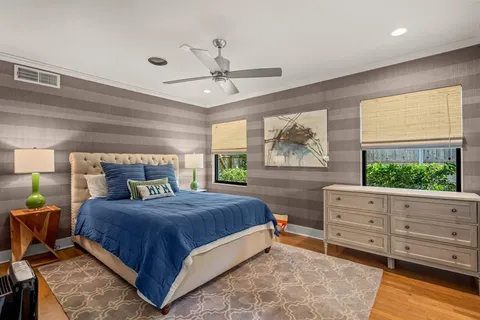 a living room with furniture and white walls