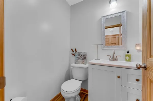 a bathroom with a toilet and a bathtub