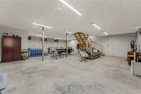 a view of a balcony with furniture