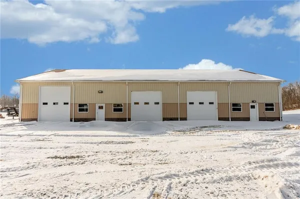 a front view of a house with patio