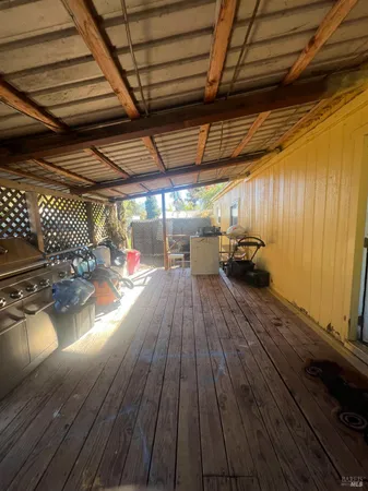 a view of a street next to a yard