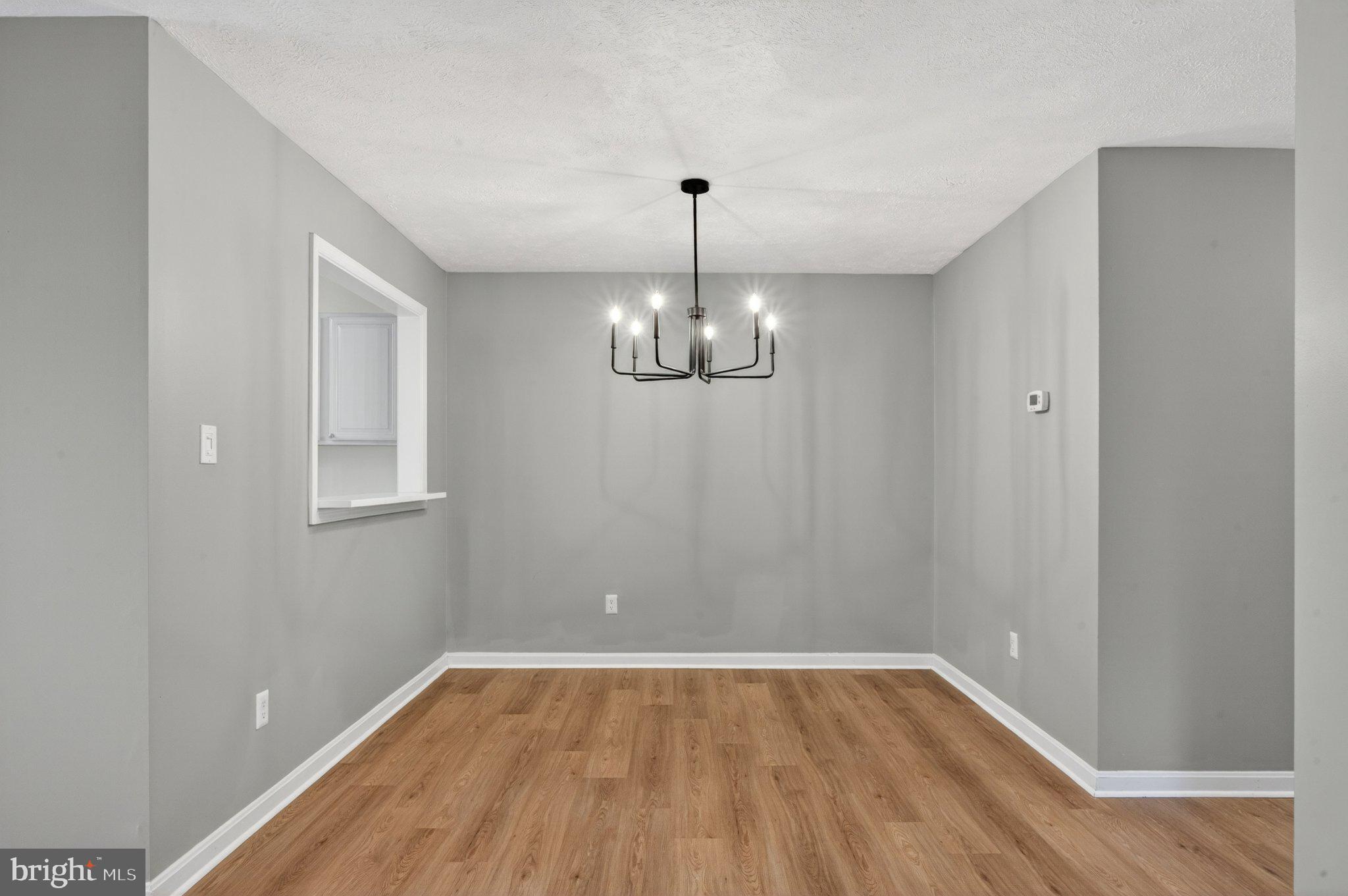10146 Oakton Terrace Road, Unit 10146 Oakton, VA 22124 - Photo 11 of 25 Bright and airy dining space awaits.