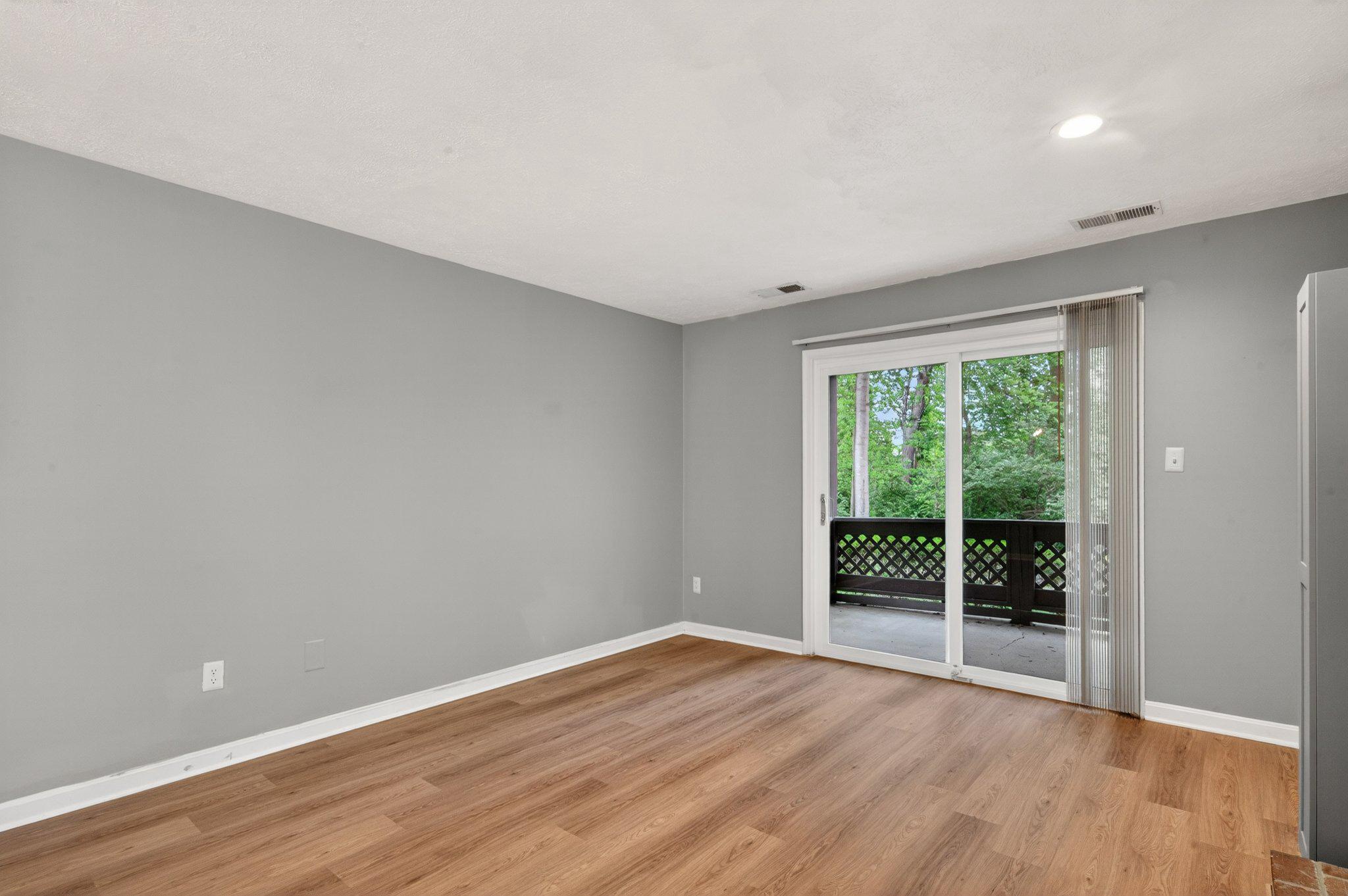 10146 Oakton Terrace Road, Unit 10146 Oakton, VA 22124 - Photo 13 of 25 Sliding Glass Door with nature views.