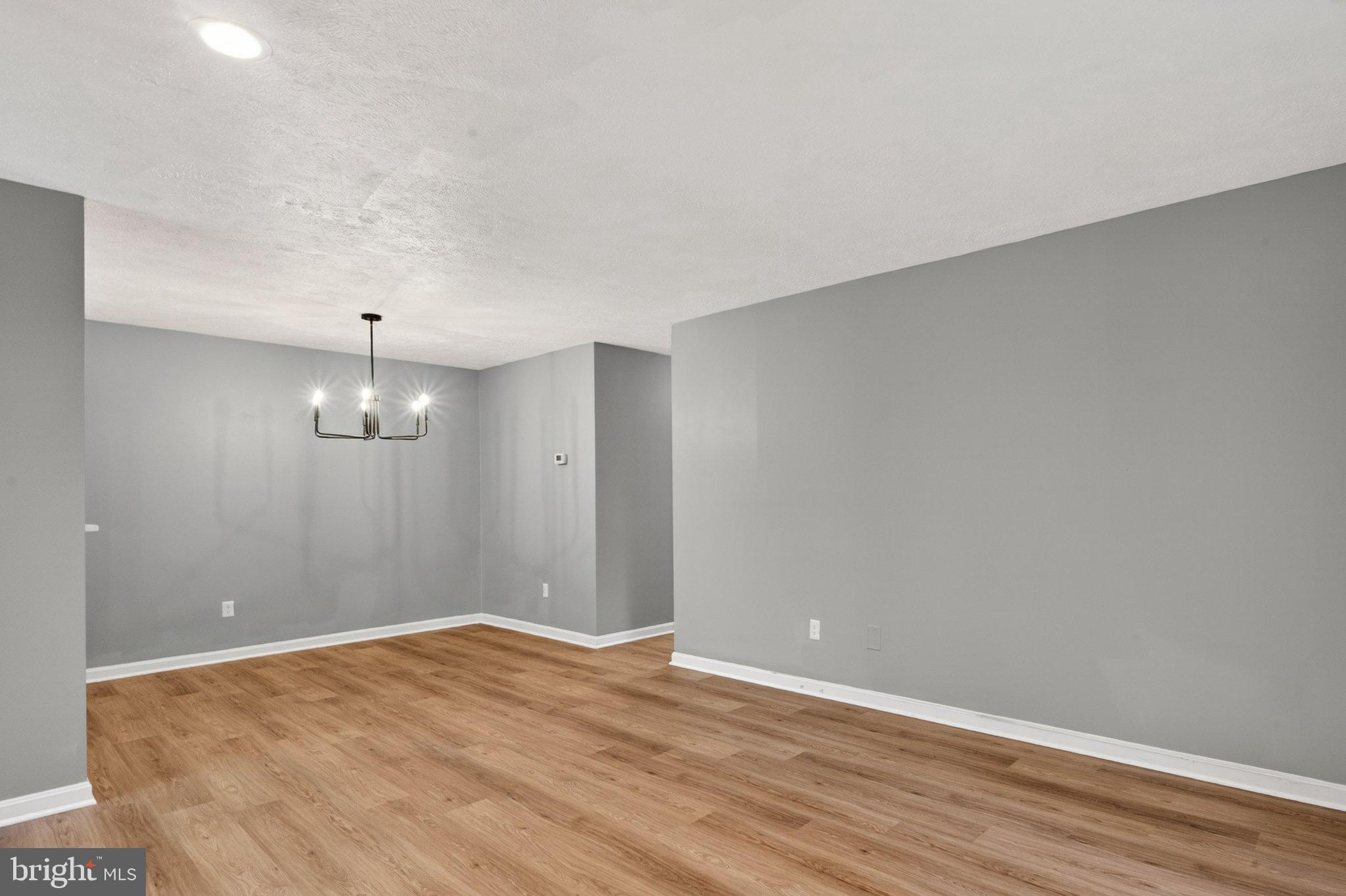 10146 Oakton Terrace Road, Unit 10146 Oakton, VA 22124 - Photo 14 of 25 Spacious, modern living area awaits you.