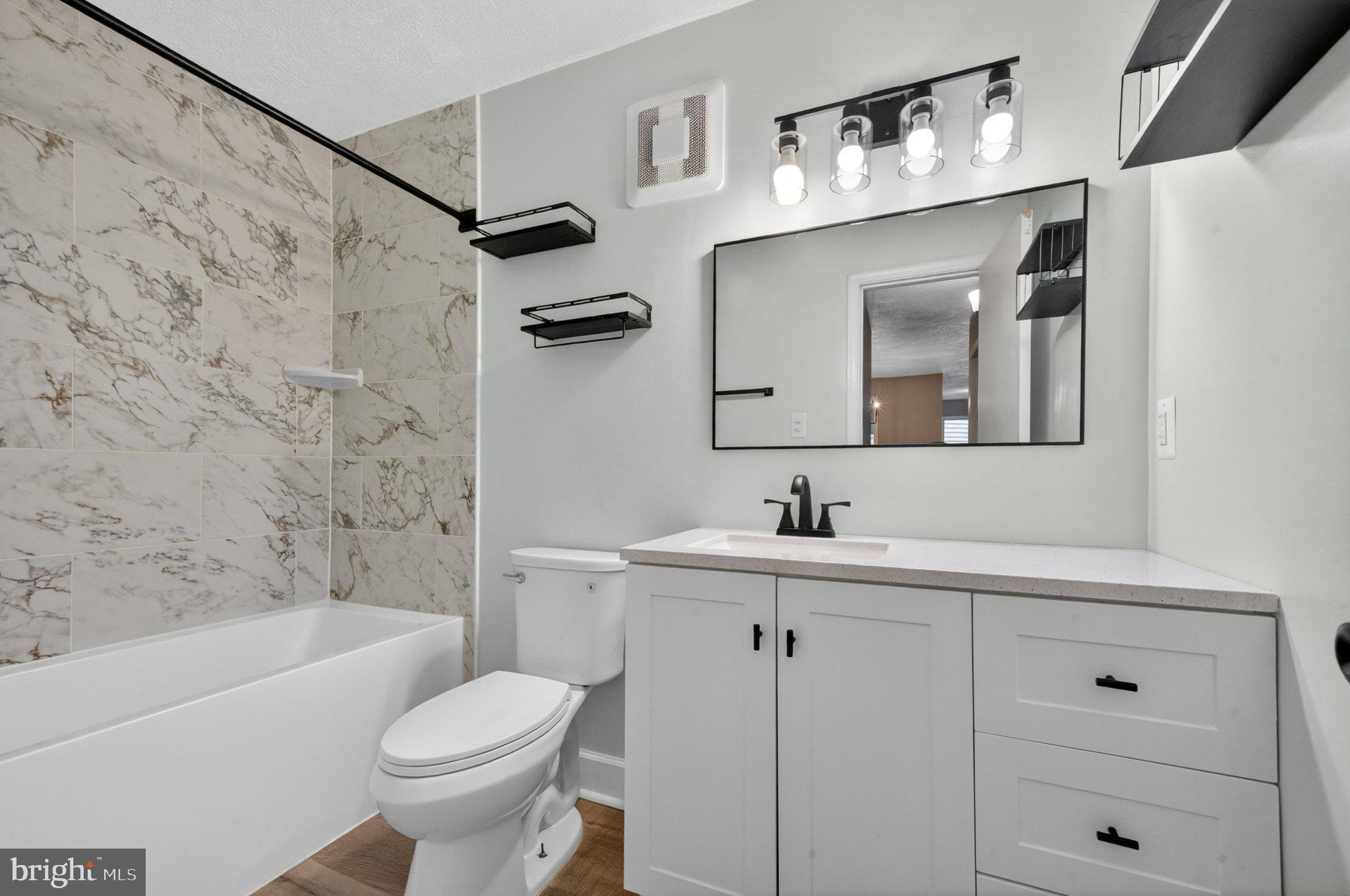 10146 Oakton Terrace Road, Unit 10146 Oakton, VA 22124 - Photo 21 of 25 Modern bathroom with elegant finishes.