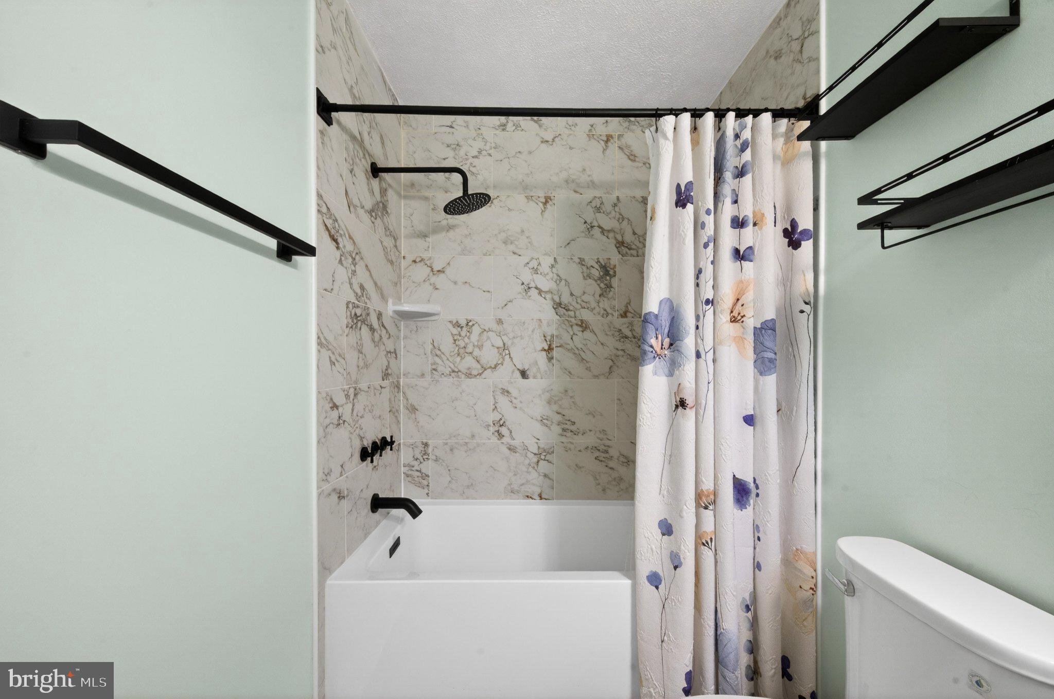 10146 Oakton Terrace Road, Unit 10146 Oakton, VA 22124 - Photo 22 of 25 Modern bathroom with elegant touches.