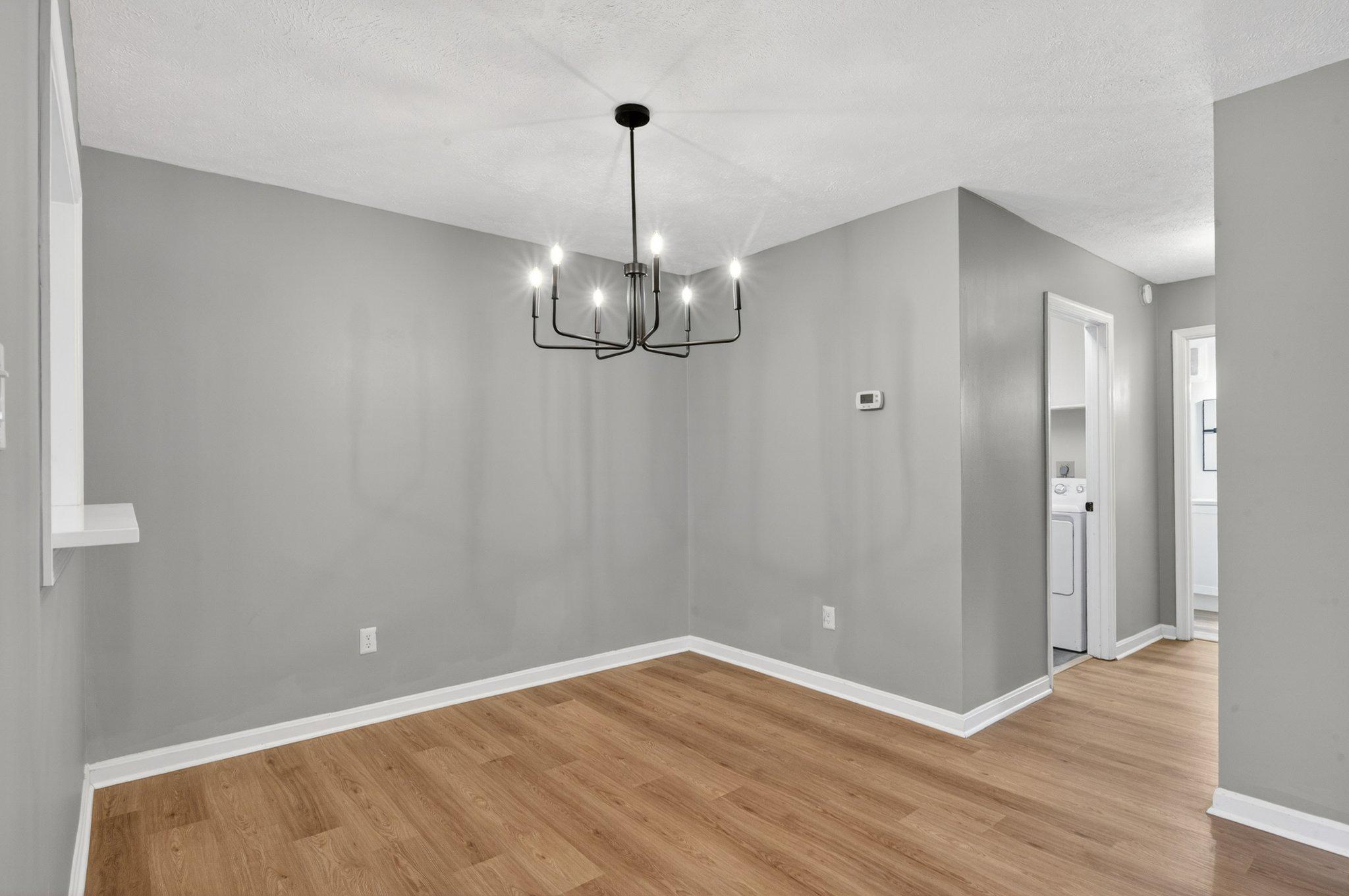 10146 Oakton Terrace Road, Unit 10146 Oakton, VA 22124 - Photo 9 of 25 Modern Dining space w/ NEW CHANDILIER