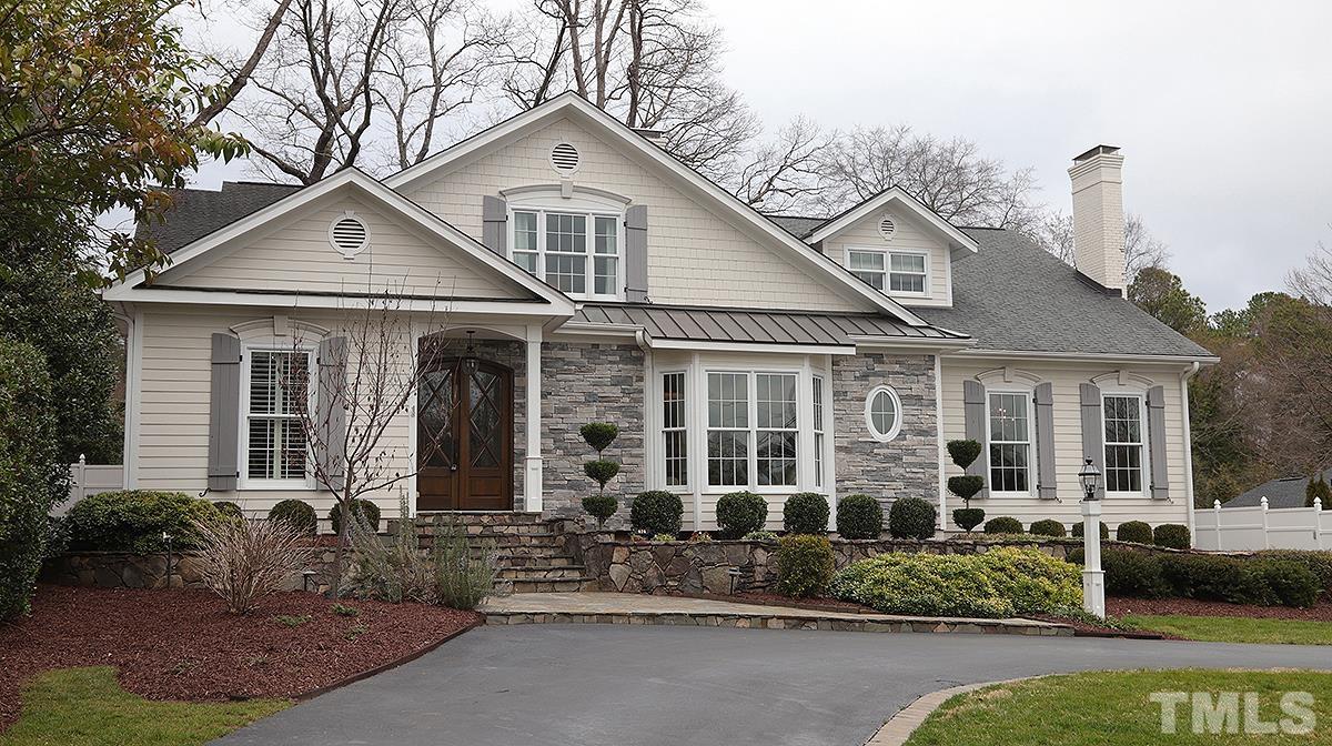 414 Yarmouth Road Raleigh, NC 27608 - Photo 3 of 42 front view of a house with a yard