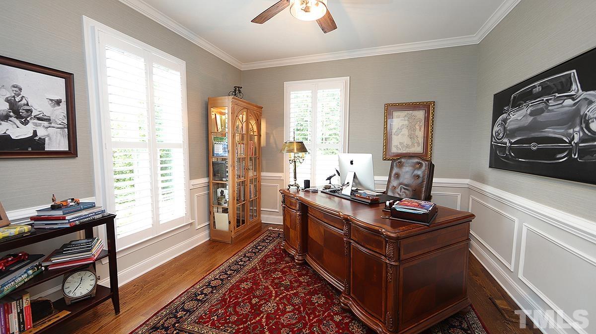 414 Yarmouth Road Raleigh, NC 27608 - Photo 8 of 42 a view of a workspace with furniture and a window