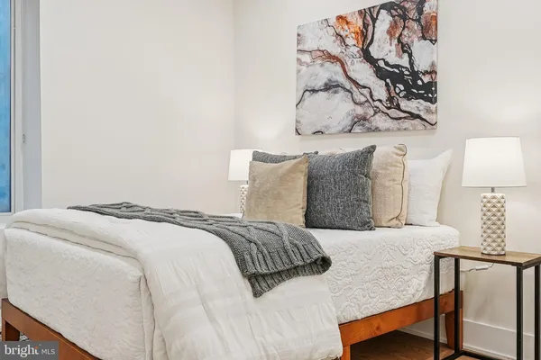 a bathroom with a double vanity sink and mirror