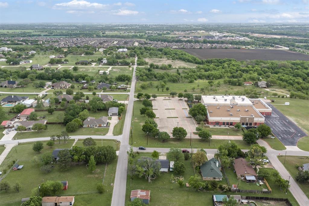 417 West 8th Street Justin, TX 76247 - Photo 37 of 40 an aerial view of residential houses with outdoor space and river