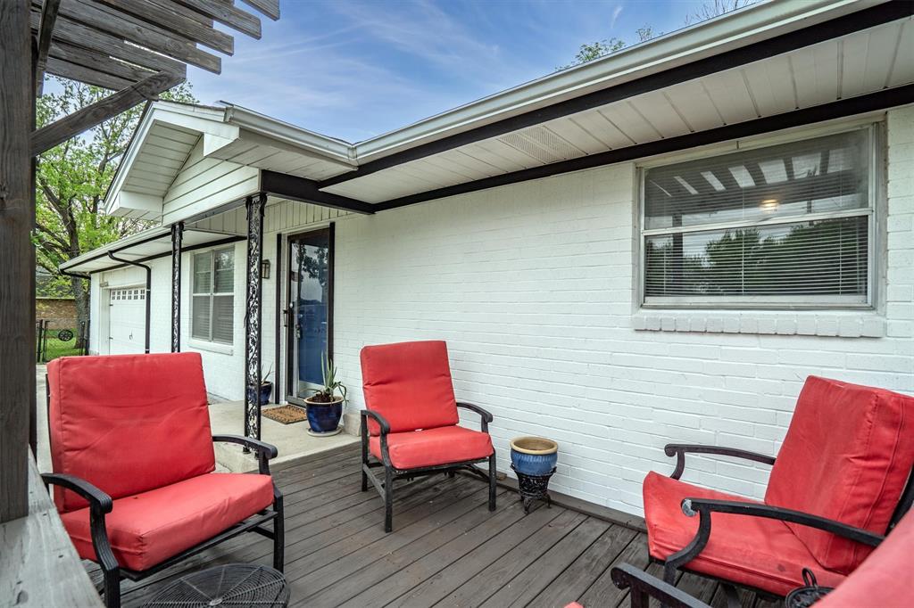 417 West 8th Street Justin, TX 76247 - Photo 5 of 40 a outdoor living space with a couch