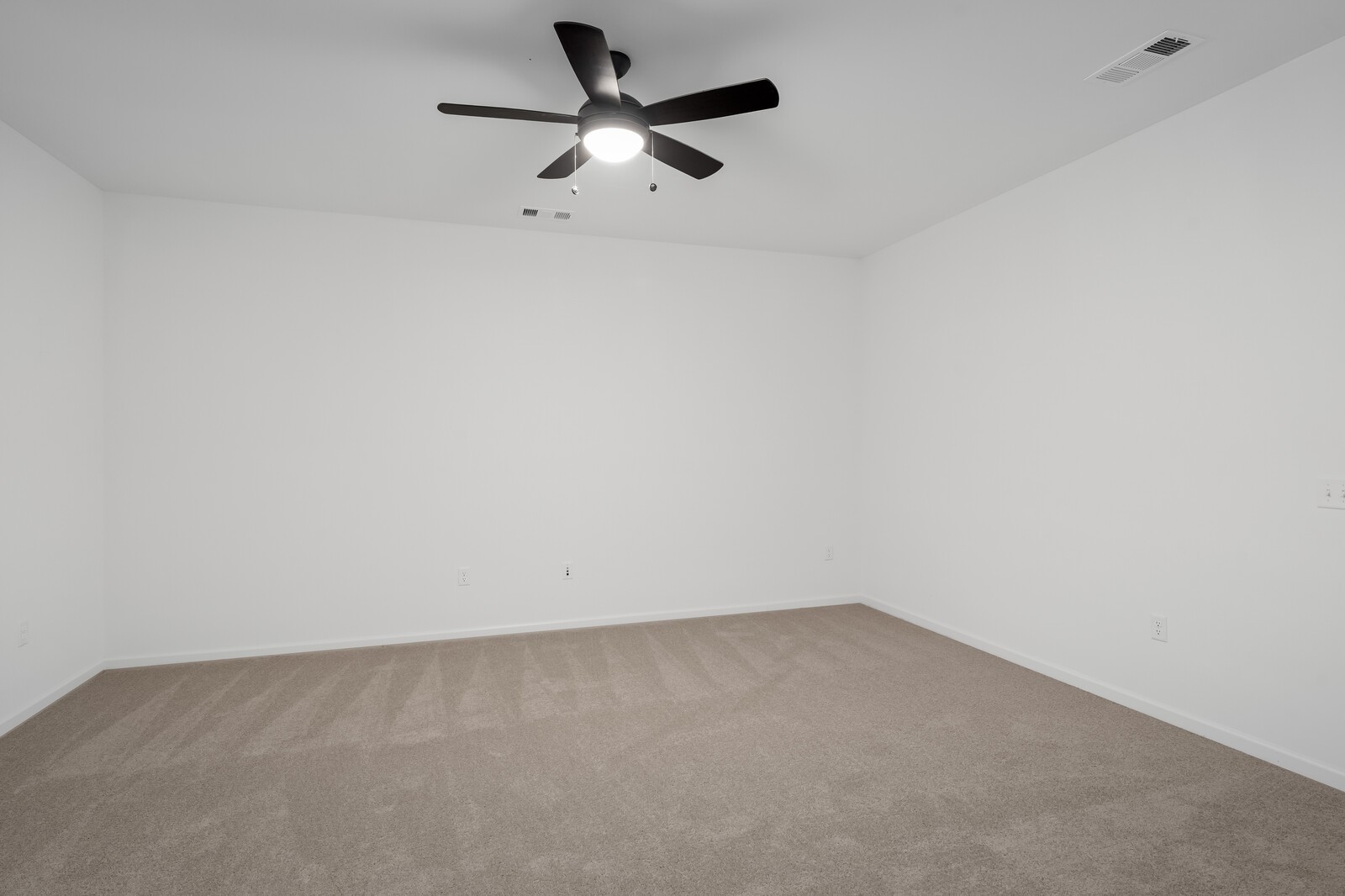 402 Blair Road Smyrna, TN 37167 - Photo 11 of 27 an empty room with a ceiling fan and window