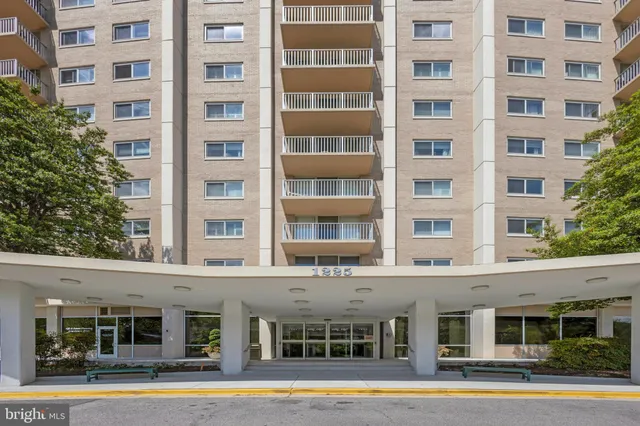 front view of a building with a swimming pool