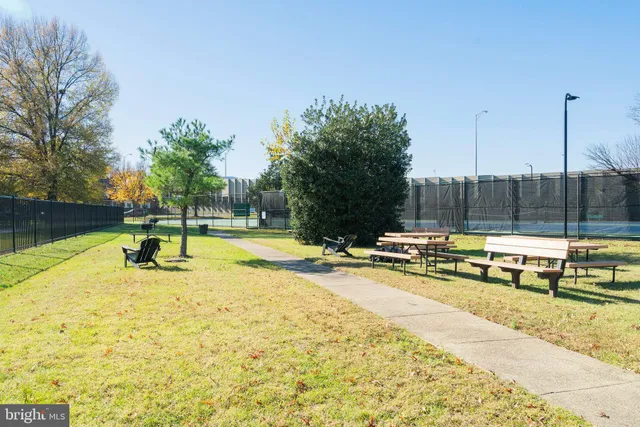 a view of swimming pool with chairs