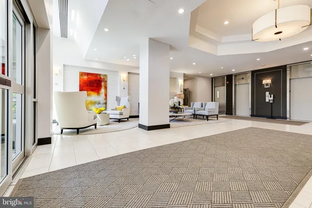 a view of a living room and entry way