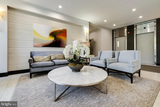 a living room with furniture and a couch